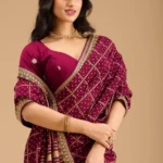 Wine Soft Raw Silk Bandhej Gold Zariwork Saree With Matching Blouse Piece